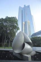 Sculpture Continuity by Max Bill 1986 in front of the high-rise, tower of the Deutsche Bank,