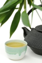 Cup and teapot with Sencha tea, green tea, green tea