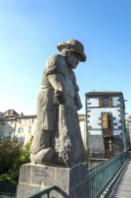 Maringues village. The monumental sculpture of the tanner. Puy de Dome dapartment.