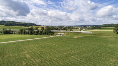 Deutsche Bahn's Intercity Express travels through the countryside, Bavaria, Germany, Europe