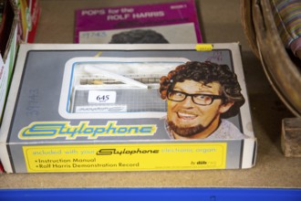 Rolf Harris branded Stylophone electronic organ set on display as an auction lot, UK