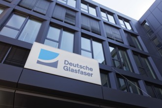 Deutsche Glasfaser Holding GmbH, logo on building, telecommunications company for broadband fibre