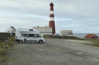 Motorhome in front of Gamvik lighthouse, the northernmost point in Norway accessible by car on the