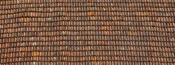 Old weathered tiled roof, residential building, Austria, Europe