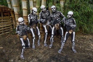 Natives with skeleton painting, Omo Bugamo tribe or skeleton people, Mount Hagen Festival in the