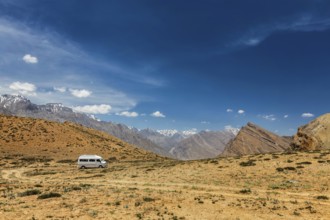 Car in Himalayan landscape. Spiti Valley, Himachal Pradesh, India, Asia