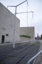 The tram overhead line is torn down after the partial collapse of the Carola Bridge in Dresden,