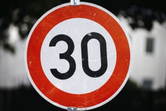 Symbol photo on the subject of speed limit 30 km/h. Close-up of a traffic sign with a 30. Berlin,