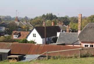 Rooftops of houses in nucleated village Shottisham, Suffolk, England, UK