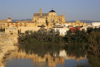 River Rio Guadalquivir and historic Mezquita cathedral buildings, Great Mosque, Cordoba, Spain,