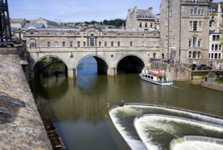 Pulteney Bridge spanning the River Avon in Bath, England completed by 1774 designed Robert Adam in