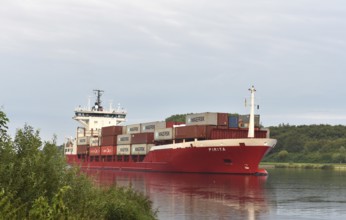 Container ship Pirita sailing in the Kiel Canal, Kiel Canal, Schleswig-Holstein, Germany, Europe