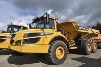 Articulated dumpers, dump trucks on a construction site, Denmark, Europe