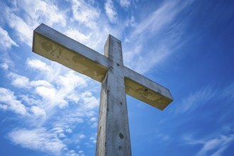 Christianity symbol Easter concept wooden cross in blue sky, AI generated