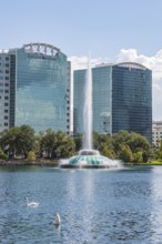 High rise buildings behind the fountain at Lake Eola in downtown Orlando, Florida, USA, North