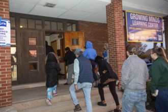 Detroit, Michigan USA, 5 November 2024, Voters enter Bethany Lutheran Church as the polls open at