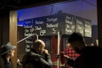 Bratwurst stand at the Christmas market Weihnachtszauber Gendarmenmarkt. The Christmas market at