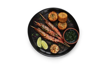 Langoustines on skewers, shrimp kebab, with fried corn, spices and herbs, homemade, no people