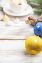 Christmas or New Year frame composition. Decorations, box, balls, cinnamon, ribbons, fir and spruce