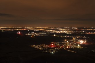 New Year's Eve fireworks 2023 at Breitenstein near Ochsenwang. View from the Swabian Alb to