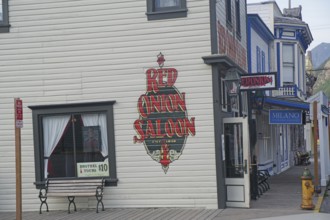 Historic house facades from the gold rush era, old brothel, Inside Passage, Skagway, Alaska, USA,