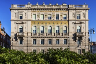 Palazzo del Governo with oriental-looking golden mosaic tiles, Piazza Unità d'Italia in the heart