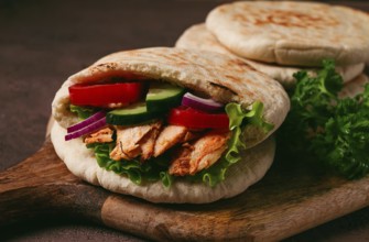 Shawarma in pita bread, chicken, with vegetables, homemade, no people