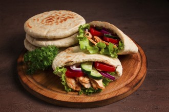 Shawarma in pita bread, chicken, with vegetables, homemade, no people