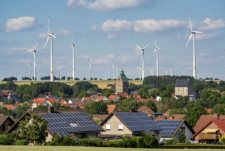 Wind farm near the East Westphalian town of Energiestadt Lichtenau, many residential buildings with