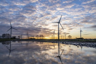 Wind farm near the East Frisian town of Norden, east of the town, sunset, Lower Saxony, Germany,