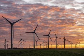 Wind farm near the East Frisian town of Norden, east of the town, sunset, Lower Saxony, Germany,