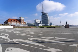 Skyline of Bremerhaven, Atlantic Sail City Hotel skyscraper, front light Bremerhaven, a red and