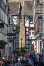 The old town of Hattingen, half-timbered houses, gastronomy in the street Kirchplatz, Protestant