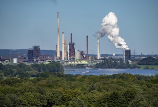 View across the Rhine to the Thyssenkrupp Steel steelworks in Duisburg-Beeckerwerth, blast