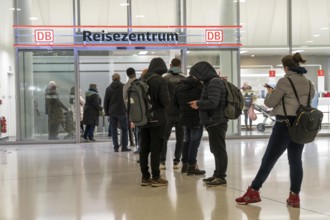 Queue of travellers at the Deutsche Bahn travel centre, Wuppertal