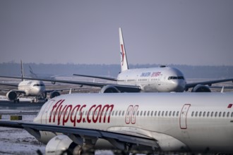 Aircraft on the taxiway at Frankfurt FRA airport, Fraport, in winter, Hesse, Germany, Europe