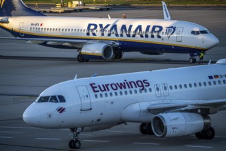 Eurowings Airbus A319 after landing on the way to Terminal 1, C-Gates, Ryanair Boeing 737 taxiing