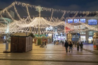 The Christmas market in Essen, Kennedyplatz, partly already set up, then stopped and temporarily