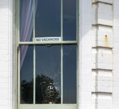 Sign in guesthouse window for No Vacancies, Lowestoft, Suffolk, England, UK