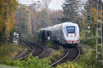 InterCityExpress ICE travelling on open track in the Nordbahnhof area in Stuttgart,