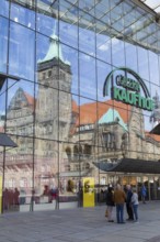 New town hall reflected in the glass façade of Galerie Kaufhof, Markt, Chemnitz, Saxony, Germany,