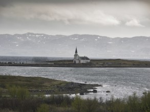 Nesseby town church, with congregation standing outside on Whit Sunday, May, Varanger Fjord,