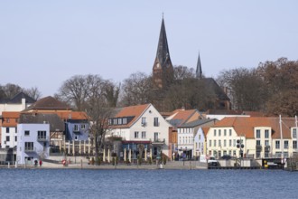 Town view at Lake Malchow with town harbour and town church, Malchow, island town, Mecklenburg Lake