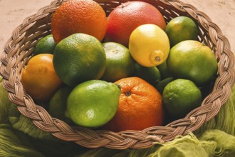 Assortment, citrus fruits, in a basket, close-up, top view, no people