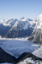 View of sea of clouds and snow-covered mountains, mountain panorama with summit Großer Hundstod,