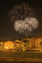 Fireworks from the Scaliger castle in the foreground Houses of, Borghetto, Valeggio sul Mincio,