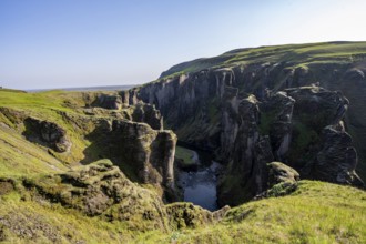 Fjaðrárgljúfur Canyon, Fjadrargljufur, rock formations in rugged deep canyon with river in the