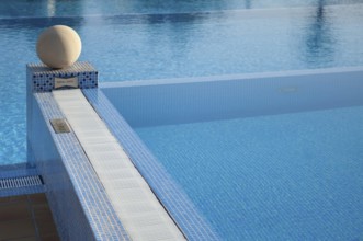 Pool area, water reflections, close-up