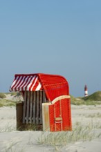 Lighthouse and beach chair, Amrum, North Frisian Islands, Schleswig-Holstein, Germany, Europe