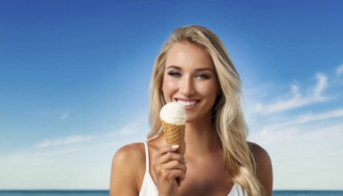 A blonde woman enjoys eating an ice cream in a cone